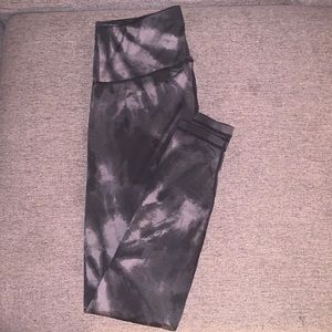 Black and grey camouflage like pattern, size M. Worn twice.